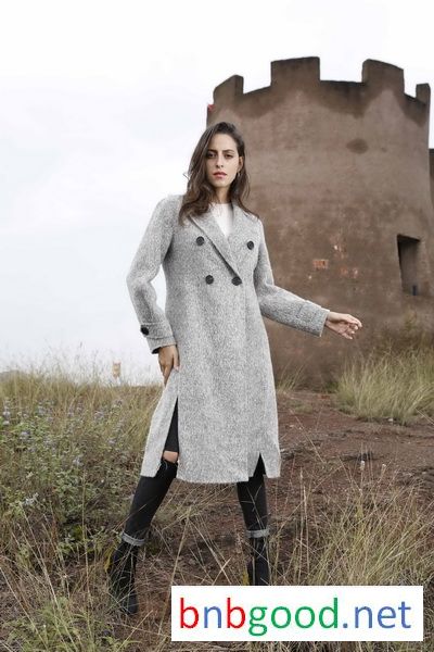 Grey black button, lady's coat.
