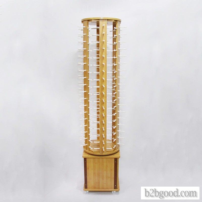 Lacquered floor-to-ceiling rotating glasses display stand